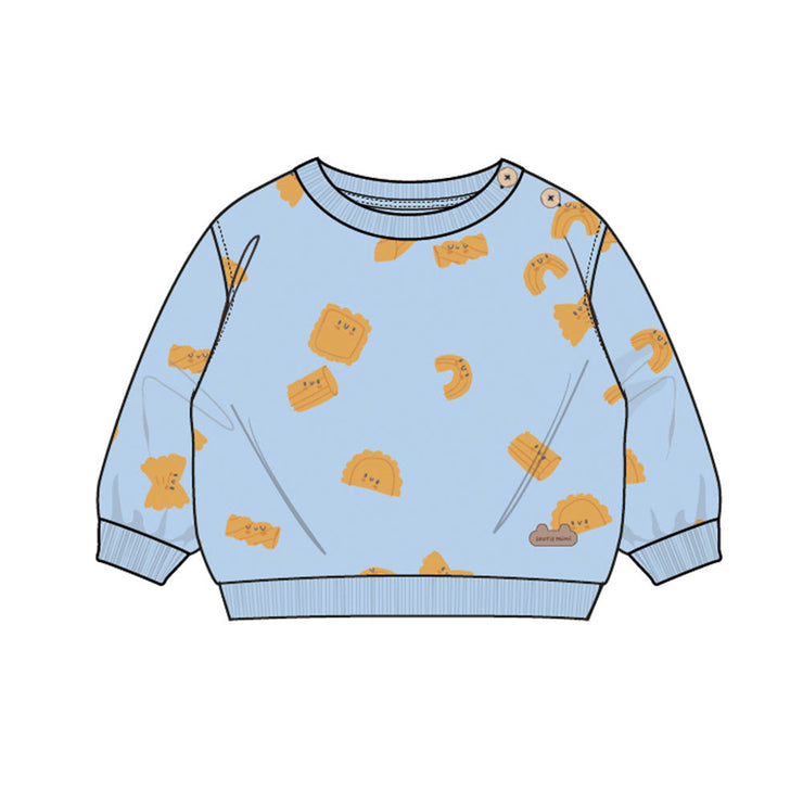 Chandail bleu à motifs de pâtes, naissance