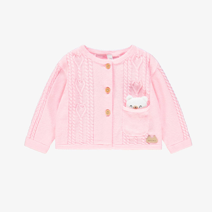 Cardigan rose en tricot, naissance