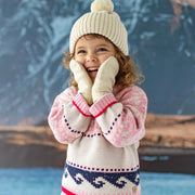 Photo d'un enfant portant le chandail rose en tricot, bébé