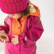 Manteau imperméable rose et orange, bébé