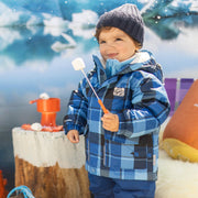Photo d'un bébé portant la tuque bleu marine en tricot, bébé