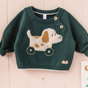 Chandail vert en tricot avec motif jacquard, naissance