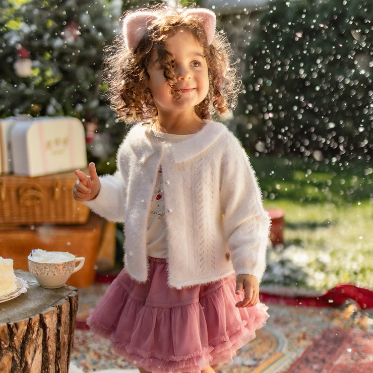 Photo d'un bébé portant la jupe rose en tulle souple, bébé