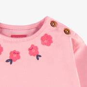 Zoom détail du t-shirt rose à motif floral, bébé