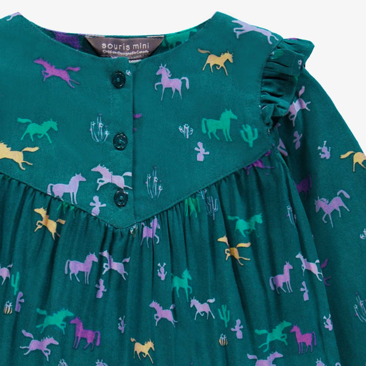 Zoom détails de la robe turquoise à motifs, bébé