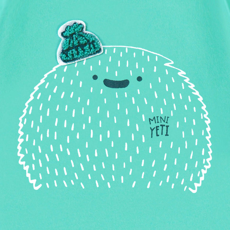 Zoom détails du t-shirt turquoise avec illustration, bébé