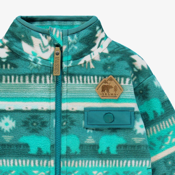 Zoom détails de la veste turquoise en polar avec motifs, bébé