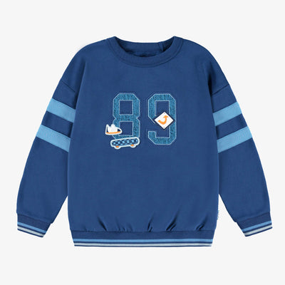 Chandail bleu avec broderie, enfant