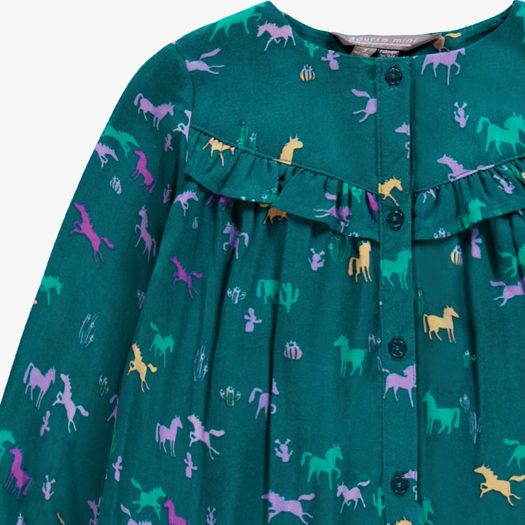 Zoom détails haut de la robe turquoise à motifs, enfant