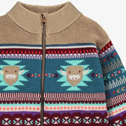Zoom détails de la veste beige en tricot avec motifs, enfant