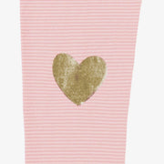 Zoom détails du legging rose avec cœurs, enfant