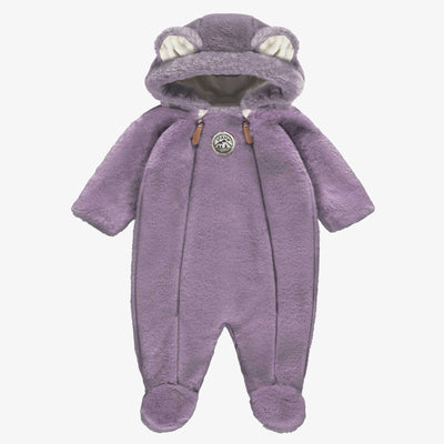 Une pièce mauve en fausse fourrure, naissance