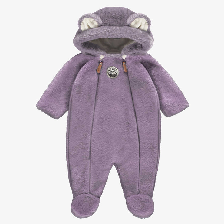 Une pièce mauve en fausse fourrure, naissance