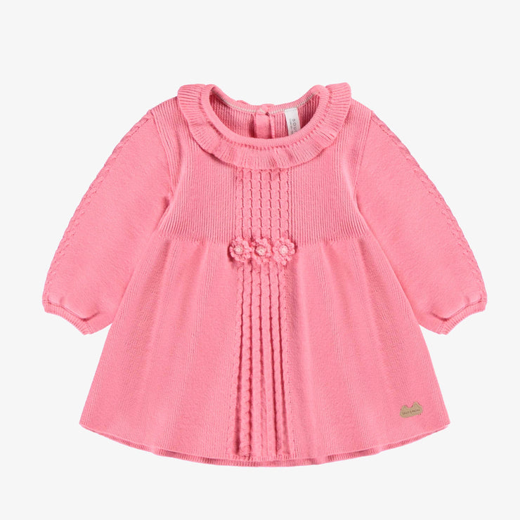 Robe rose en tricot, naissance