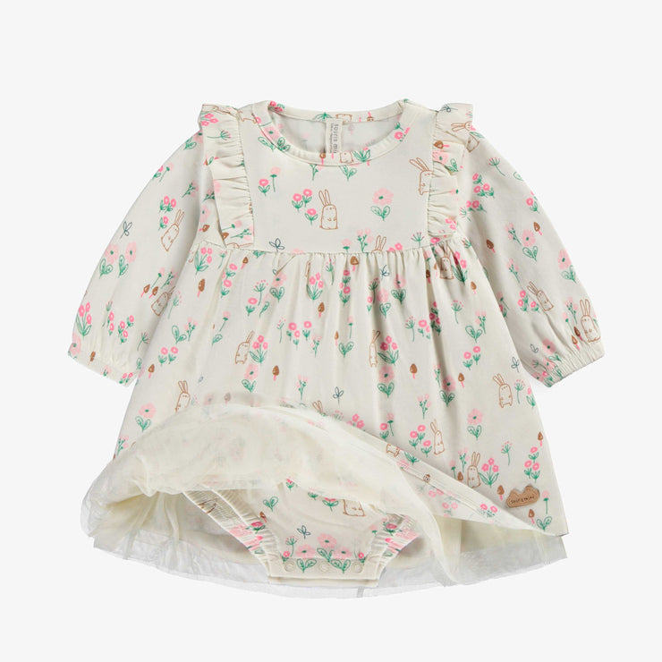 Robe crème à motifs, naissance