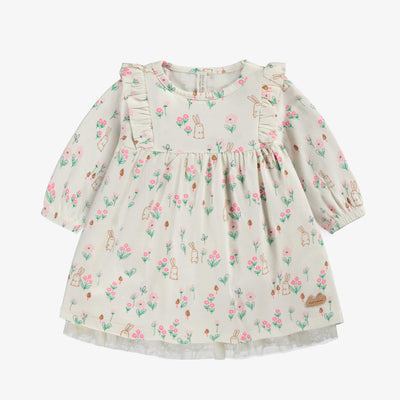 Robe crème à motifs, naissance