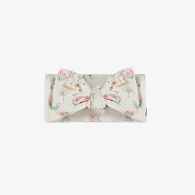 Bandeau crème à motifs, naissance