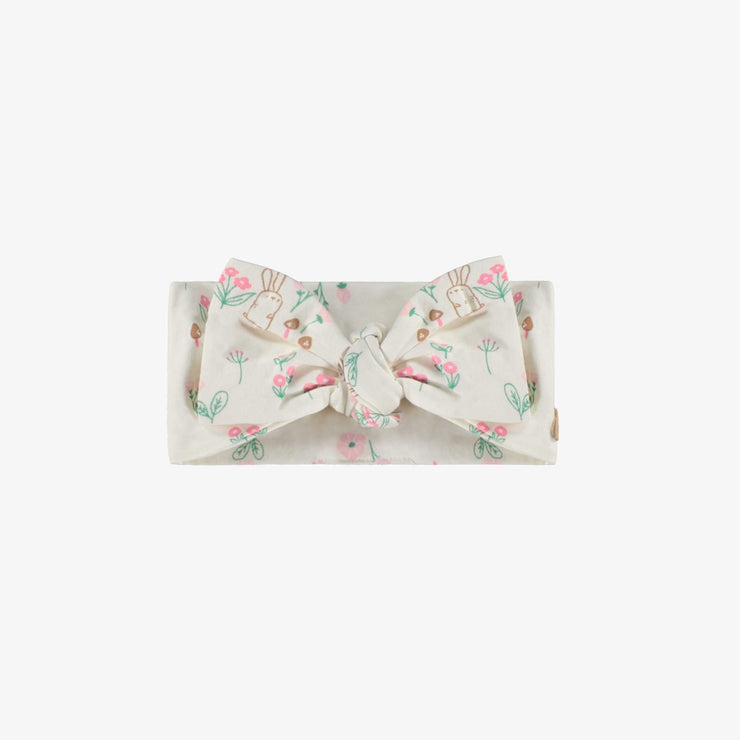 Bandeau crème à motifs, naissance