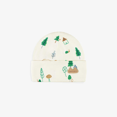 Bonnet crème à motifs, naissance
