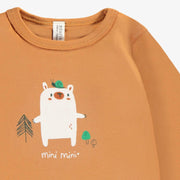 Zoom imprimé du cache-couche brun avec illustration, naissance