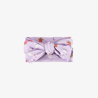 Bandeau mauve à motifs, naissance