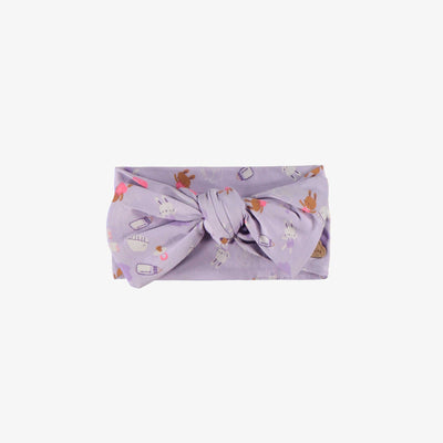 Bandeau mauve à motifs, naissance