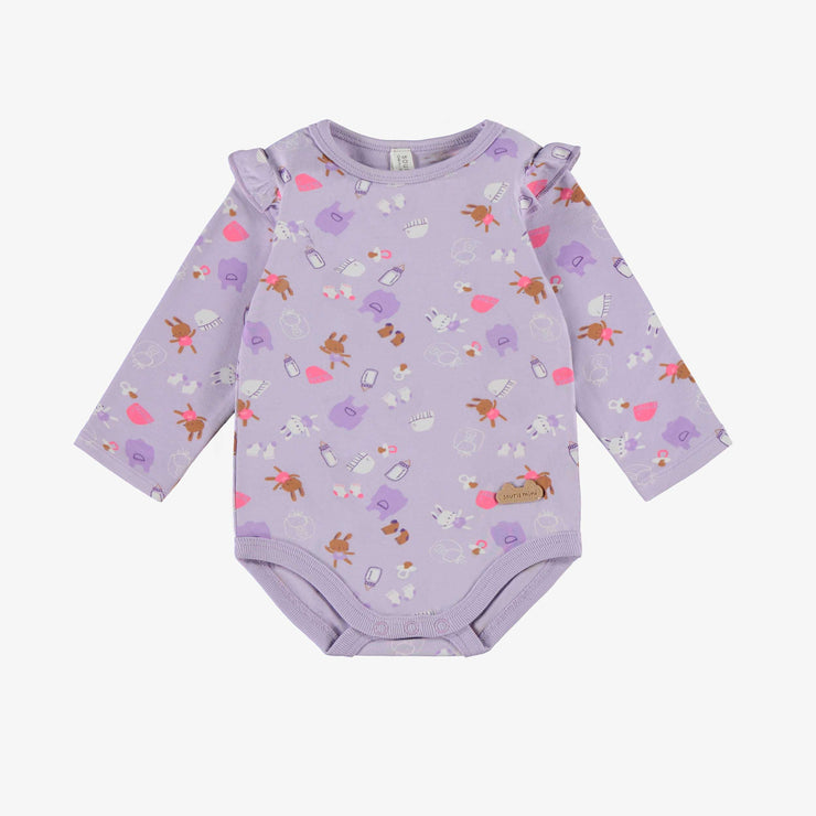Cache-couche mauve à motifs, naissance
