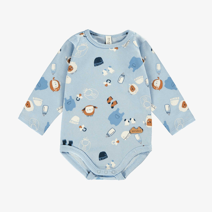 Cache-couche bleu à motifs, naissance