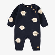 Une pièce bleu marine en tricot, naissance