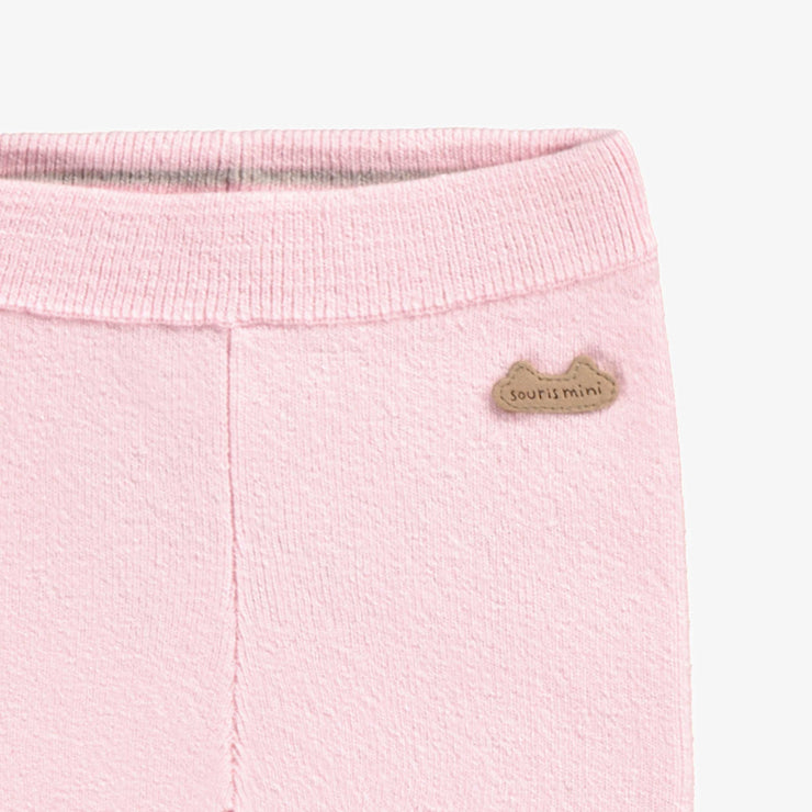 Legging rose en tricot, naissance