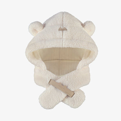 Chapeau crème en sherpa, naissance