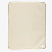Revers de la couverture crème en sherpa