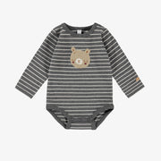 Cache-couche gris à rayures, naissance