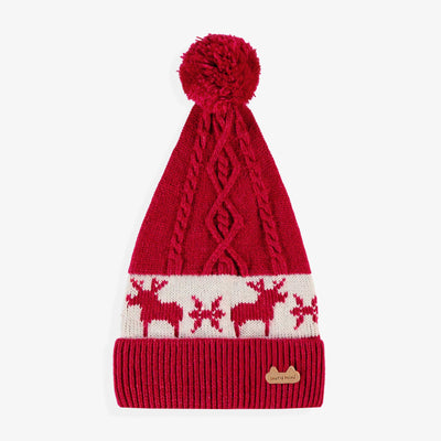 Bonnet rouge à motifs jacquard, naissance