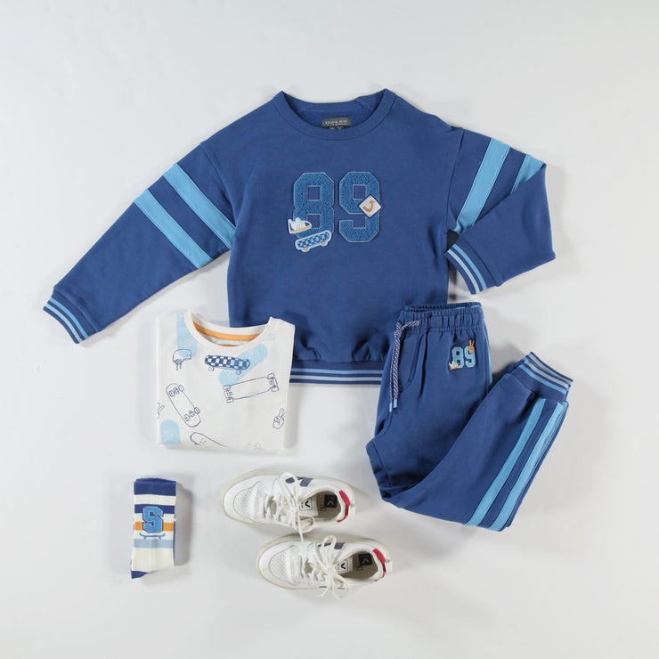 Chandail bleu avec broderie, enfant