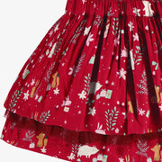Zoom détails de la jupe rouge à motifs festifs, enfant