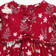 Zoom détails de la robe rouge à motifs festifs, bébé 