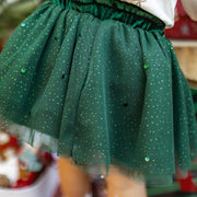 Gros plan sur une jupe verte en tulle pailleté pour fille, parfaite pour les tenues festives de Noël, collection Souris Mini.